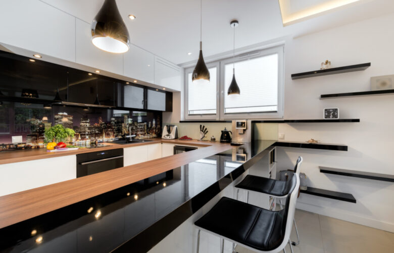 Modern open space luxury kitchen in black and white design